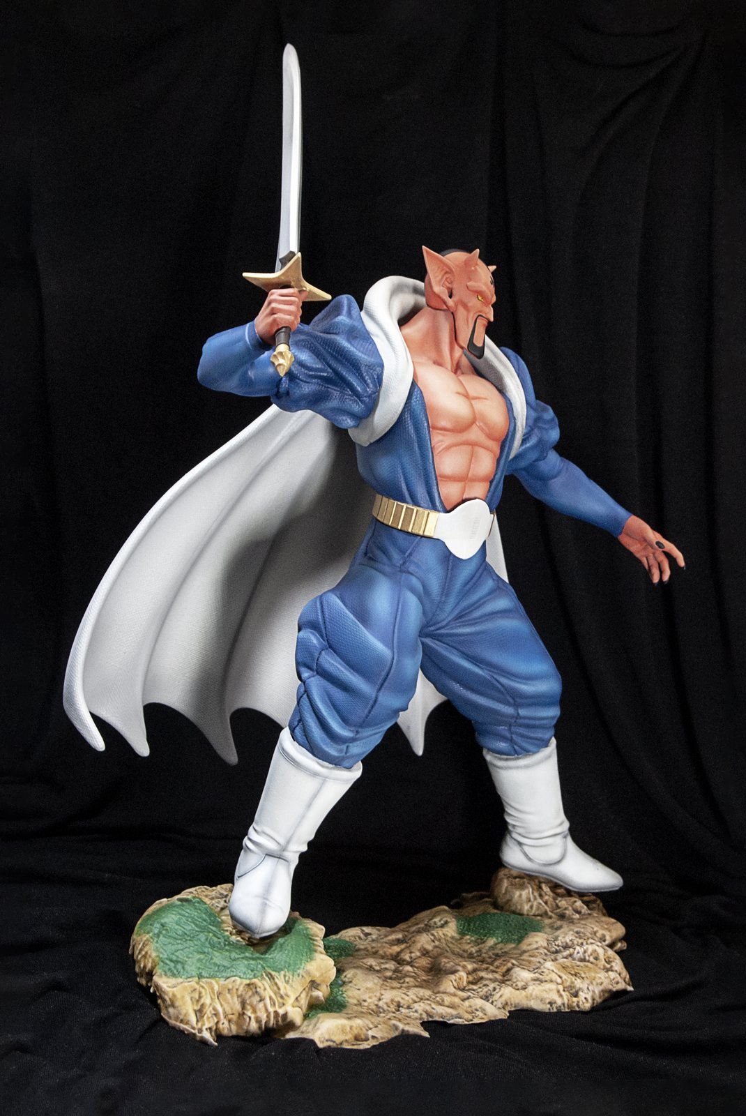 Detalle del pintado de una figura de coleccion impresa en resina